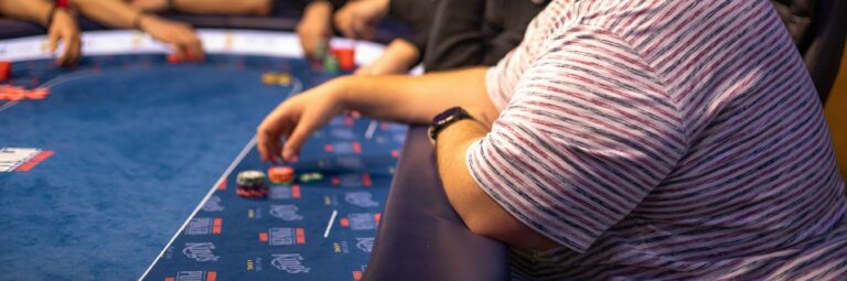 A poker player at a poker table.